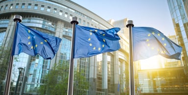 European union eu flags flying in front of building
